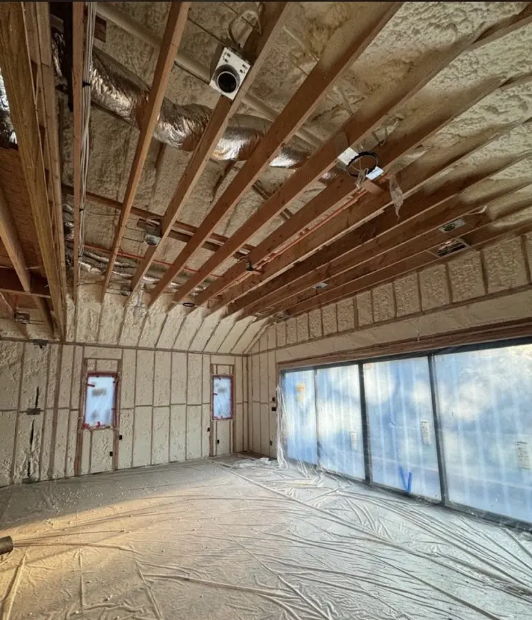 Interior walls and ceiling insulated with spray foam during new construction in California City